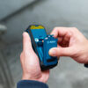Bosch 50m Laser Measure - Removing the Battery Removing the rechargeable battery pack from a Bosch 50m green beam laser measure.