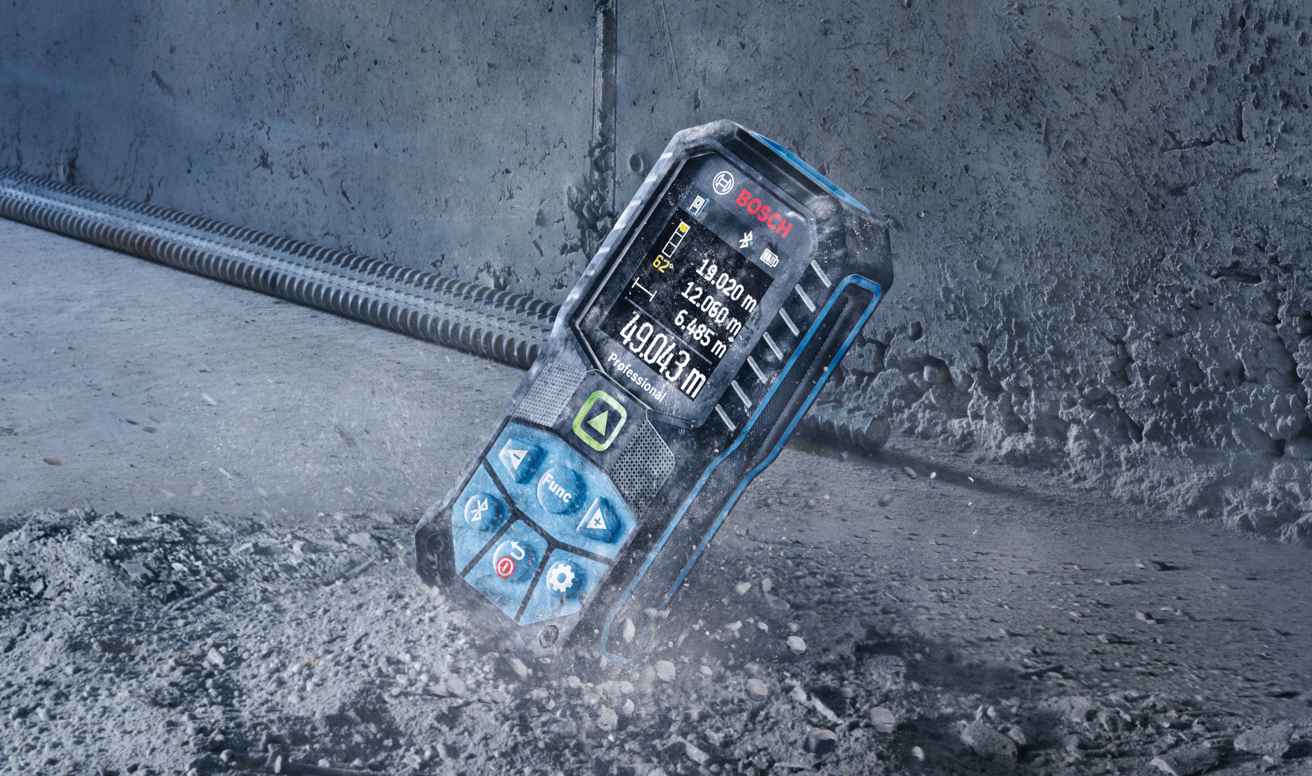 Bosch 50m Laser Measure - 1.5m Drop Resistance Bosch 50m laser measure impacting the ground to demonstrate 1.5m drop resistance.