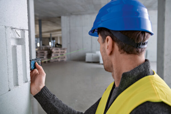 Bosch 50m Laser Measure - Green Beam In Use High-visibility green laser beam active on a Bosch GLM 50-27 CG professional measure.