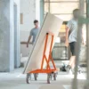 Mondelin 900kg Board Trolley – End Profile Corridor View End-on view showing the slim profile of the Mondelin 900kg board trolley carrying large sheets down a hallway, available for tool hire from Weller Hire.