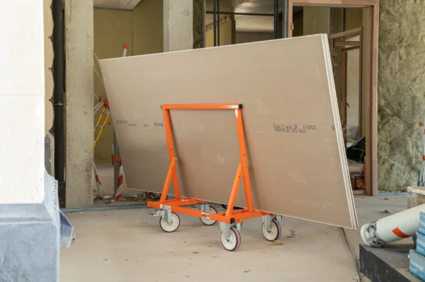 Mondelin 900kg Board Trolley – Full Side Profile Full side profile of the Mondelin 900kg capacity wheeled board trolley fully loaded with plasterboard, offered for hire by Weller Hire.